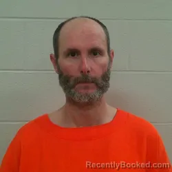 Mugshot of Travis Lee Rubeck booked in Carroll County, Indiana on October 18, 2026