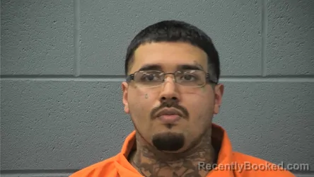 Mugshot of CHRISTIAN XAVIER REYNOSO booked in Cass County, Indiana on April 10, 2026