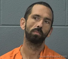 Mugshot of Ian Douglas Kellett booked in Cass County, Indiana on August 12, 2026