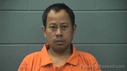 Mugshot of Aung Than Tun booked in Cass County, Indiana on August 29, 2026