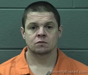 Mugshot of Dustin Roy Hampshire booked in Cass County, Indiana on October 7, 2026