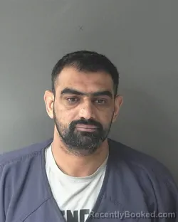 Mugshot of Malkeet Singh