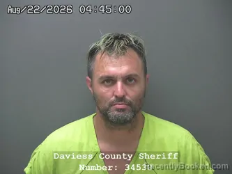 Mugshot of Dustin Ray Cox booked in Daviess County, Indiana on August 21, 2026