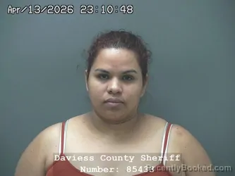 Mugshot of CARMEN YULISSA FUENTES-PEREZ booked in Daviess County, Indiana on April 13, 2026