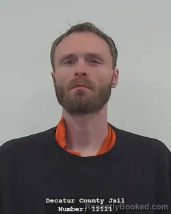 Mugshot of TYLER THEO MEADOWS booked in Decatur County, Indiana on March 23, 2026