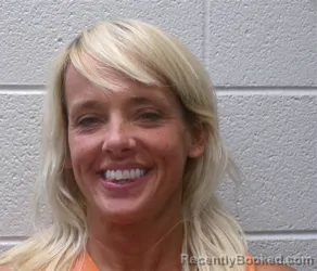 Mugshot of KRISTEN LEIGH OGLE booked in Henderson County, North Carolina on May 13, 2026