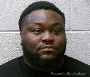 Mugshot of AARON CINQQUANE JENKINS booked in Henderson County, North Carolina on April 15, 2026