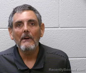Mugshot of Michael David Hill booked in Henderson County, North Carolina on October 7, 2026