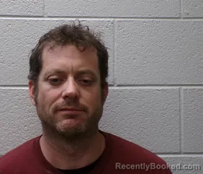 Mugshot of DAVIS ROGER SUAREZ booked in Henderson County, North Carolina on April 17, 2026