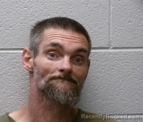 Mugshot of LEWIS EARL MCMAHAN booked in Henderson County, North Carolina on June 21, 2026