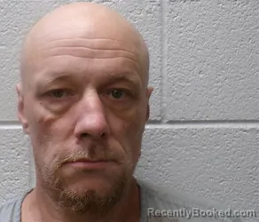 Mugshot of Casey Quinton Burnett booked in Henderson County, North Carolina on August 28, 2026