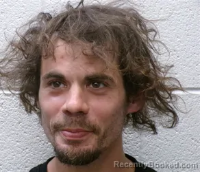 Mugshot of TYLER SCOTT GARREN booked in Henderson County, North Carolina on April 24, 2026