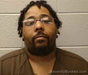 Mugshot of SHAQUIL DION MITTER booked in Henderson County, North Carolina on April 29, 2026