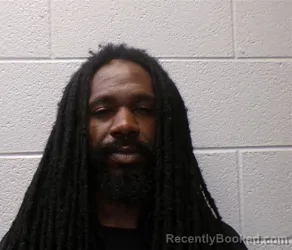 Mugshot of ANTWAN LAMART MOORE booked in Henderson County, North Carolina on July 5, 2026