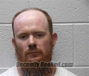 Mugshot of Jonathan Charles Moffitt booked in Henderson County, North Carolina on October 25, 2026