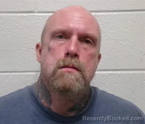 Mugshot of BRIAN CHRISTOPHER TIGHE booked in Henderson County, North Carolina on July 16, 2026