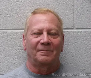 Mugshot of GLEN ALAN FIRN booked in Henderson County, North Carolina on April 21, 2026