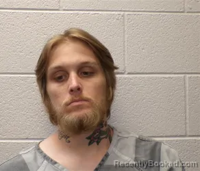 Mugshot of JACOB ARON DEAVER booked in Henderson County, North Carolina on April 30, 2026