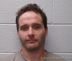 Mugshot of JASON TYLER ROGER WHITE booked in Henderson County, North Carolina on May 13, 2026