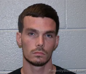 Mugshot of DALTON SHANE BAYNARD booked in Henderson County, North Carolina on July 9, 2026