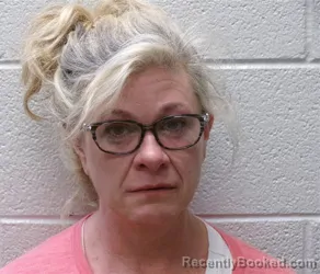 Mugshot of ANDREA MACIASZEK SLAMA booked in Henderson County, North Carolina on April 16, 2026