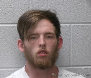 Mugshot of AARON LEE ROLLS booked in Henderson County, North Carolina on May 14, 2026