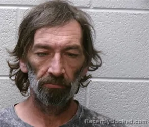 Mugshot of MARCUS ANDREW HETRICK