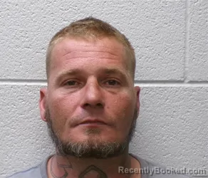 Mugshot of Curtis Jerry Holland booked in Henderson County, North Carolina on September 4, 2026