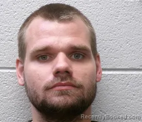 Mugshot of JAMES MITCHELL WALKER booked in Henderson County, North Carolina on April 22, 2026