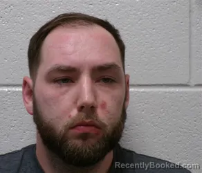 Mugshot of JOSHUA DANIEL SNYDER booked in Henderson County, North Carolina on April 4, 2026