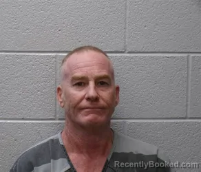 Mugshot of John Edward Reilly booked in Henderson County, North Carolina on August 27, 2026