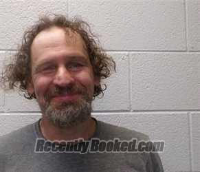 Mugshot of TIMOTHY WADE DUDNEY booked in Henderson County, North Carolina on April 15, 2026