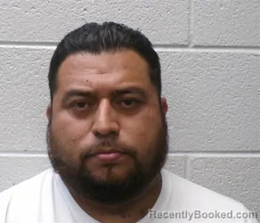 Mugshot of MARCO ANTONIO PADRON-BUENO booked in Henderson County, North Carolina on April 22, 2026