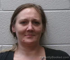 Mugshot of Amber Newland Browning booked in Henderson County, North Carolina on October 6, 2026