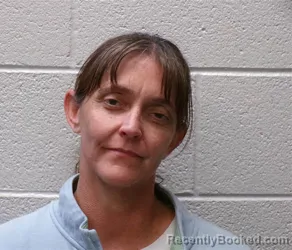 Mugshot of ANGIE MARIE LAWRENCE booked in Henderson County, North Carolina on May 7, 2026