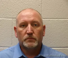 Mugshot of Christopher Raymond Smith booked in Henderson County, North Carolina on September 11, 2026
