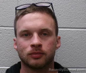 Mugshot of RUSSELL TYLER LEDFORD booked in Henderson County, North Carolina on May 14, 2026