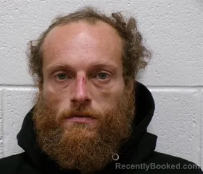 Mugshot of Jonathan David Schultz booked in Henderson County, North Carolina on September 8, 2026