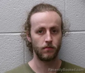 Mugshot of JUSTIN WILLIAM CALLAHAN booked in Henderson County, North Carolina on July 17, 2026