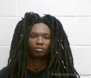 Mugshot of DAQUANE SHARON'E WASHINGTON booked in Henderson County, North Carolina on May 14, 2026