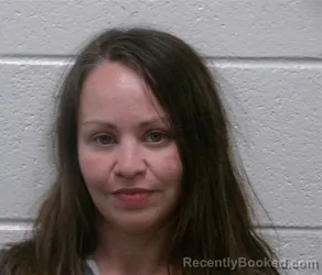 Mugshot of CARLY MARIE SMATHERS booked in Henderson County, North Carolina on March 26, 2026