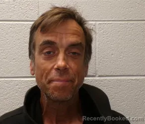 Mugshot of ANDREW BRYCE LEDWITH booked in Henderson County, North Carolina on April 25, 2026