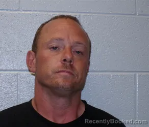 Mugshot of JOSHUA DANIEL CLAYTON booked in Henderson County, North Carolina on April 29, 2026
