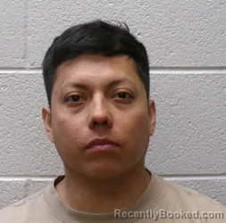 Mugshot of JUAN D GARCIA POGAN booked in Henderson County, North Carolina on May 1, 2026