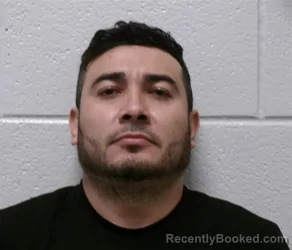 Mugshot of JUAN CARLOS AGUIRRE VALADEZ booked in Henderson County, North Carolina on May 8, 2026