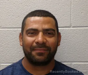 Mugshot of DENIS OMAR FLORES RAMIREZ booked in Henderson County, North Carolina on May 29, 2026