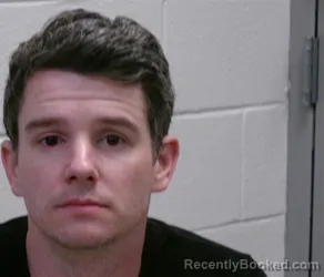 Mugshot of TROY PHILLIPS GARRETT booked in Henderson County, North Carolina on June 21, 2026