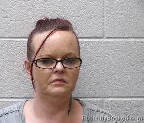 Mugshot of COURTNEY SUE MOTTS booked in Henderson County, North Carolina on June 26, 2026