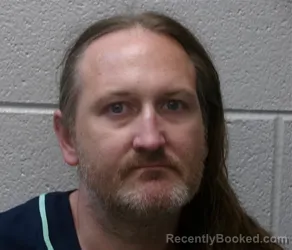Mugshot of JONATHAN ARNOLD EVANS booked in Henderson County, North Carolina on July 1, 2026