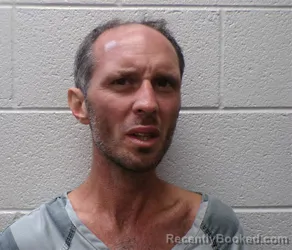Mugshot of DERRICK REINELT booked in Henderson County, North Carolina on July 5, 2026